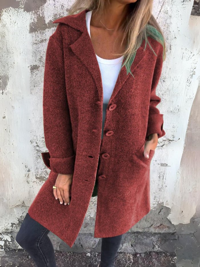 Cappotto lungo elegante con revers da donna